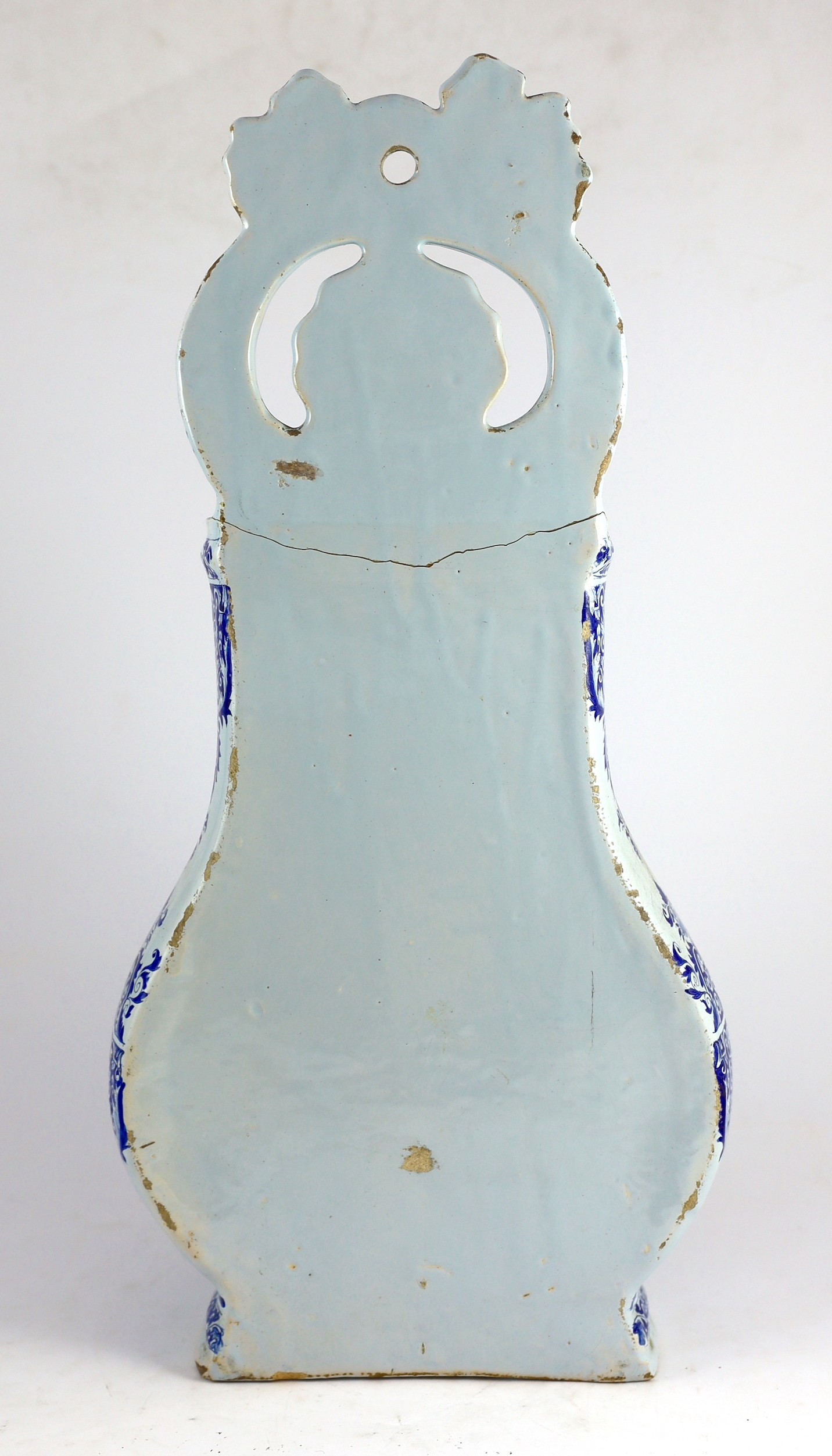 A large Rouen faience blue and white cistern, second quarter 18th century, 57.5cms high 57.5cm high, restorations